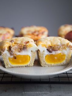 small muffins with eggs and sausage on a plate