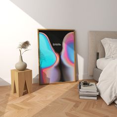 a bedroom with a bed, nightstand and poster on the wall