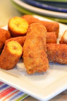 some fried food is on a white plate