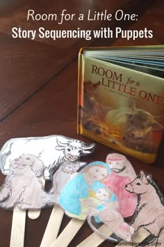 room for a little one story sequence with puppets and book on the table next to it