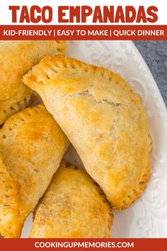 some taco empanadas on a white plate