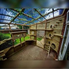 the inside of a bird house with lots of windows