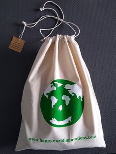 a white bag with a green globe on it