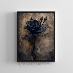 a black rose on a brown background in a frame