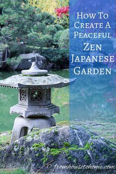 a stone lantern sitting on top of a lush green field