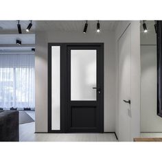 a black and white door in a room