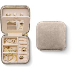 an open jewelry case filled with lots of different items