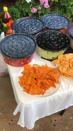 some food is sitting on a table outside