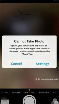 an iphone screen with the text cannot take photo