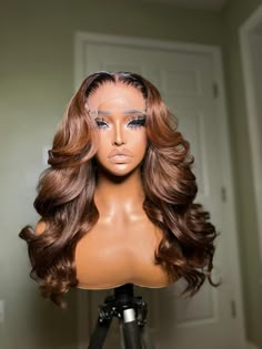 This is a GLUELESS PREMADE UNIT* All PRE ORDERED wigs take 10-15 business days to be completed. The standard shipping time is 2-3 days. All wigs come fully customized and ready to wear with combs and adjustable straps. All premade wigs come in standard sizes that fit 20in-23.5in head sizes. Wig Specs Style: layered throughoutLength: 20” Hair type: Virgin body wave Color: soft brown base with dark roots Lace: Transparent 5x5 lace closure Density: 250% Brown Wig Hairstyles, Brown Wigs Black Women, Brown Wigs For Black Women, Dramatic Hairstyles, Layered Hair Wig, Types Of Wigs, Wig Customization, Wig With Layers, Brown Hair Wig