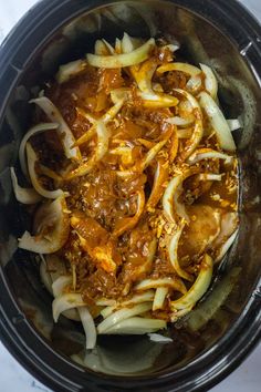 the food in the crock pot is ready to be cooked and put into the slow cooker