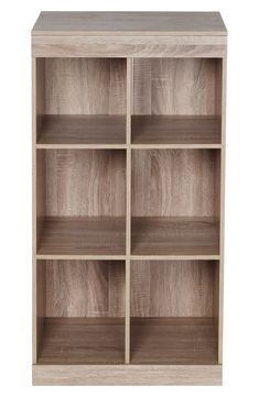 an open bookcase with wooden shelves on the front and bottom, in light brown