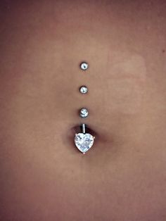 an image of a woman's stomach with diamonds on it