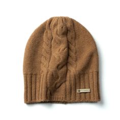 a brown knitted hat with a cable on the front and side, against a white background