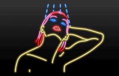 a neon woman with her hands behind her head