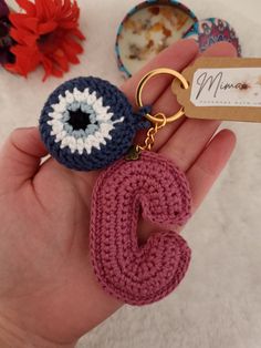 🧶 Handmade crochet keychain with great care. If you want to give a unique touch to your keys, this exclusive handmade keychain is undoubtedly an original gift to surprise someone or yourself. ♥️ 100% Unique, since, being handmade, no two are alike. ♥️ 100% Customizable, being able to choose the initial, as well as the colors. 🧿 Initial Collection with Amulet: With this design you will make your keychain even more personal. The main color can be chosen from all the colors shown in the image, pl N Keychain, Evil Eye Crochet Keychain, Turkish Eye, Crochet Maxi, Key Accessories, Protection Amulet, Original Gifts, Crochet Keychain, Tiny Treasures