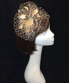 Delicate peach fascinator perfect for the guest who wants something fairly understated.  This design is a beautiful selection of glass effect leaves and flowers clustered together amongst a fine layer of veiling and set onto a fine comfort base tiara band. As with all our designs, this piece can be made exact to the image or in any colour combination to match in with your outfit. If a specific colour is required customers can message over an image of their outfit and accessories, or if time allo Spring Wedding Flower-shaped Fascinator, Summer Formal Flower-shaped Fascinator, Luxury Flower-shaped Wedding Fascinator, Luxury Hat-shaped Fascinator For Ceremonies, Elegant Luxury Flower-shaped Fascinator, Wedding Hats, Color Swatches, Fabric Swatches, Wedding Hair Accessories