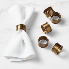 napkin rings and napkin on a marble surface