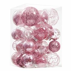 a clear box filled with pink and silver christmas bauble ornament balls