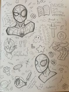 a book with drawings on it and some writing in the pages, including spider - man