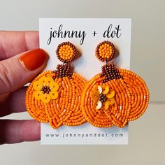 Fall in love with our Beaded Pumpkin Earrings! These festive earrings will have you craving all things pumpkin all season long!  DETAILS: Measures 2 inches wide x 2 1/4 inches long Lightweight at just 2 ounces each Orange felt liner on the back of the earring Beaded Pumpkin Earrings, Beaded Pumpkin, Festive Earrings, Pumpkin Earrings, Fall Earrings, Fall In Love, Jewelry Earrings Dangle, Etsy Earrings, Dangle Drop Earrings