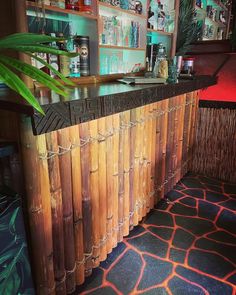 a bamboo bar in a tropical themed restaurant