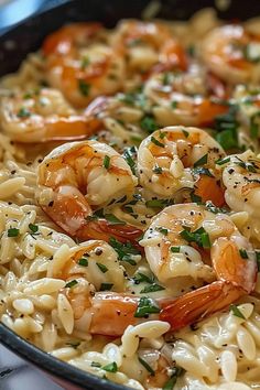 pasta with shrimp and parmesan cheese in a skillet