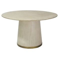 a round wooden table with a gold base