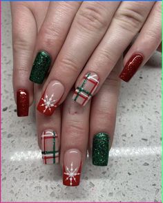 Get ready to sleigh the holiday season with our 60 Creative Christmas Nail Design Ideas for 2023! From festive red and green classics to dazzling winter wonderland nails, these designs will make your manicure merry and bright. Whether you're an expert nail artist or a DIY enthusiast, there's a look here for everyone. #ChristmasNails #NailArt #HolidayManicure Red Christmas Nails, Christmas Nails Easy, Cute Christmas Nails, Christmas Gel Nails, Christmas Nail Art Designs, Makijaż Smokey Eye, Christmas Nails Acrylic