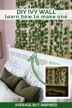 a living room with green plants on the wall and an image of a couch in front of it