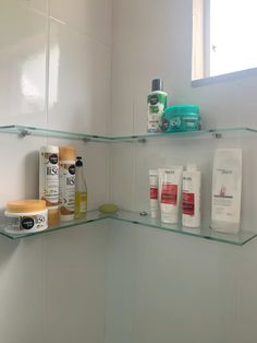 the shelves in the bathroom are filled with different types of skin care products and lotion