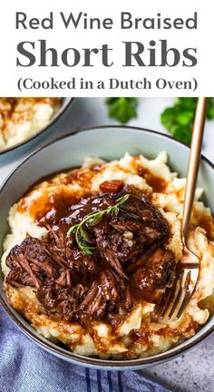 red wine braised short ribs are served over mashed potatoes with gravy