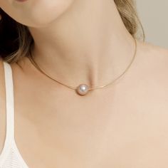 This pendant includes a beautiful pink 13mm round freshwater cultured pearl that is AAAA quality with 'Very High' luster, our highest grade available. The  thick round omega chain is made of 14K gold, and you have the choice of white gold or yellow gold in various lengths. This piece comes packaged in a beautiful jewelry box for that perfect gift. Solitaire Necklace, White Gold Chains, Buy Necklace, Pearl Necklaces, Solitaire Necklaces, Yellow Gold Chain, Freshwater Pearl Necklaces, Elegant Gift, Gold Chains