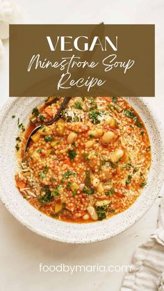 vegan minestone soup recipe in a white bowl with a spoon on the side