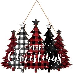 three christmas trees hanging from a string with the words merry christmas written on them in black and red