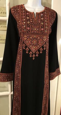 Black dress / Tobe / Thobe / Kaftan with Brown and colourful | Etsy Embellished Fabric, Beautiful Black Dress, Beautiful Black Dresses, Stitch Embroidery, Embroidery Dress, Dress Fabric, Cross Stitch Embroidery, Bohemian Style, Beautiful Dresses