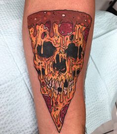 a piece of pizza with melted cheese and skulls on it's legs is shown