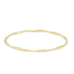 Graceful and elegant, this fashion bangle bracelet is a great day or evening wardrobe choice. Crafted in warm 14K gold, this polished design is gently twisted for a shimmering look. Wear two or more together for a bohemian chic look. Buffed to a bril Elegant Twisted Jewelry With Polished Finish, Elegant Hoop Bangle With Polished Finish, Adjustable Yellow Gold Flexible Bangle, Adjustable Flexible Yellow Gold Bangle, Modern Twist Yellow Gold Bangle Bracelet, Elegant 14k Yellow Gold Bangle, Yellow Gold Flexible Bangle Bracelet, Flexible Yellow Gold Bangle Bracelets, Adjustable Yellow Gold Bracelets With A Modern Twist