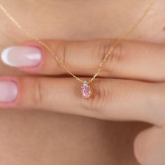 "The pink tourmaline stone represents the woman. It is a stone that symbolizes harmony and balance. Our single diamond oval pink tourmaline necklace is a jewel that you can use daily and on special occasions with its minimalist design. It is a nice gift for yourself and your loved ones. The birthstone of those born in October is pink tourmaline. 🔸🔸 Our elegant, style and stylish products suitable for special occasions and daily use are produced with love and care for you and your loved ones. ? Pink Oval Jewelry Gift, Pink Oval Pendant Jewelry For Wedding, Pink Oval Fine Jewelry Necklaces, Pink Oval Fine Jewelry Necklace, Pink Birthstone Necklace For Gift, Fine Jewelry Pink Oval Necklace, Pink Minimalist Birthstone Necklace, Pink Birthstone Oval Pendant Jewelry, Pink Oval Necklace With Natural Stones