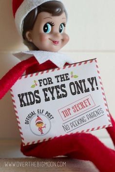 an elf is holding up a sign for the kids's eyes only top secret