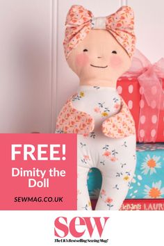 a doll sitting on top of a pile of presents with the text free dimity the doll semag co uk