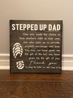 a wooden sign that says, steped up dad on the side of a wall