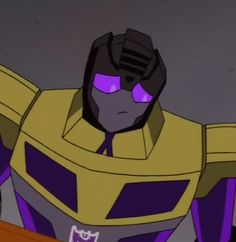 an animated character with purple and yellow colors