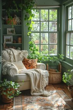 a living room filled with furniture and lots of plants