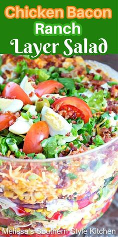 chicken bacon ranch layer salad with lettuce and tomatoes in a large glass bowl