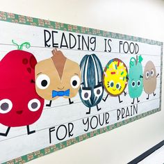 a sign that says reading is food for your brain on the side of a wall