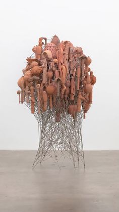 the sculpture is made up of many objects