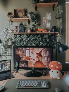 a computer monitor sitting on top of a desk next to a keyboard and mouse in front of a window