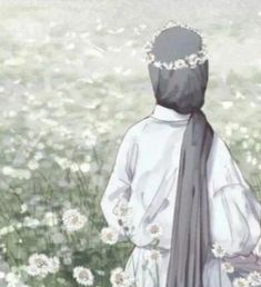 a person standing in a field of flowers with a veil over their head and back to the camera