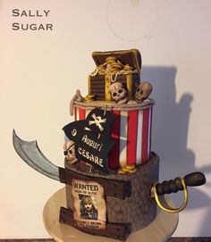 a pirate themed cake is on display for the guests to enjoy it's time